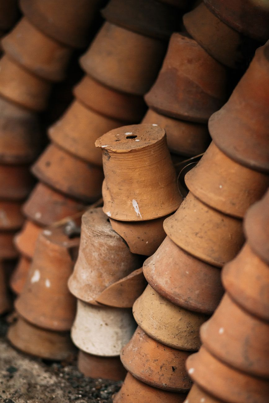 a stack of clay plant pots